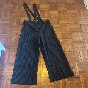 Pinstriped pants with suspenders